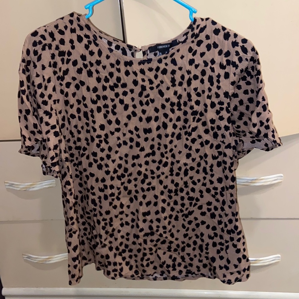 Size medium cheetah print shirt